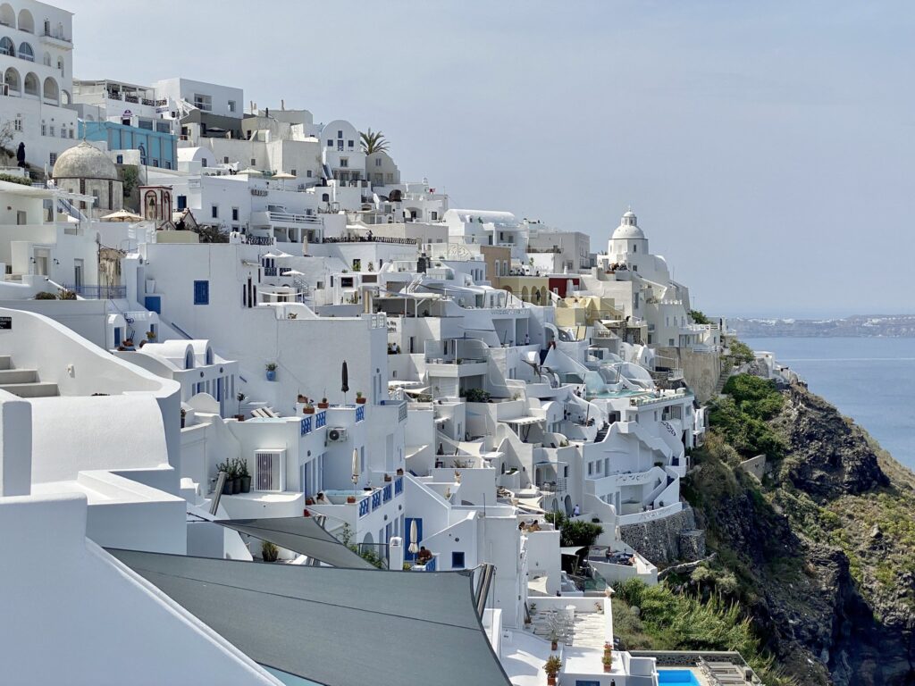 Cooling cities with white roofs