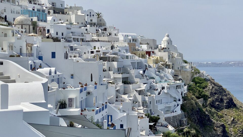 Cooling cities with white roofs